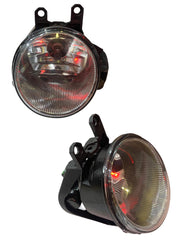Two car fog lights on a white background