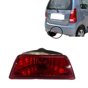 A red rear bumper light for a Maruti Wagonr (2006-2010) model, showing the light and the back of a vehicle with a visible license plate.