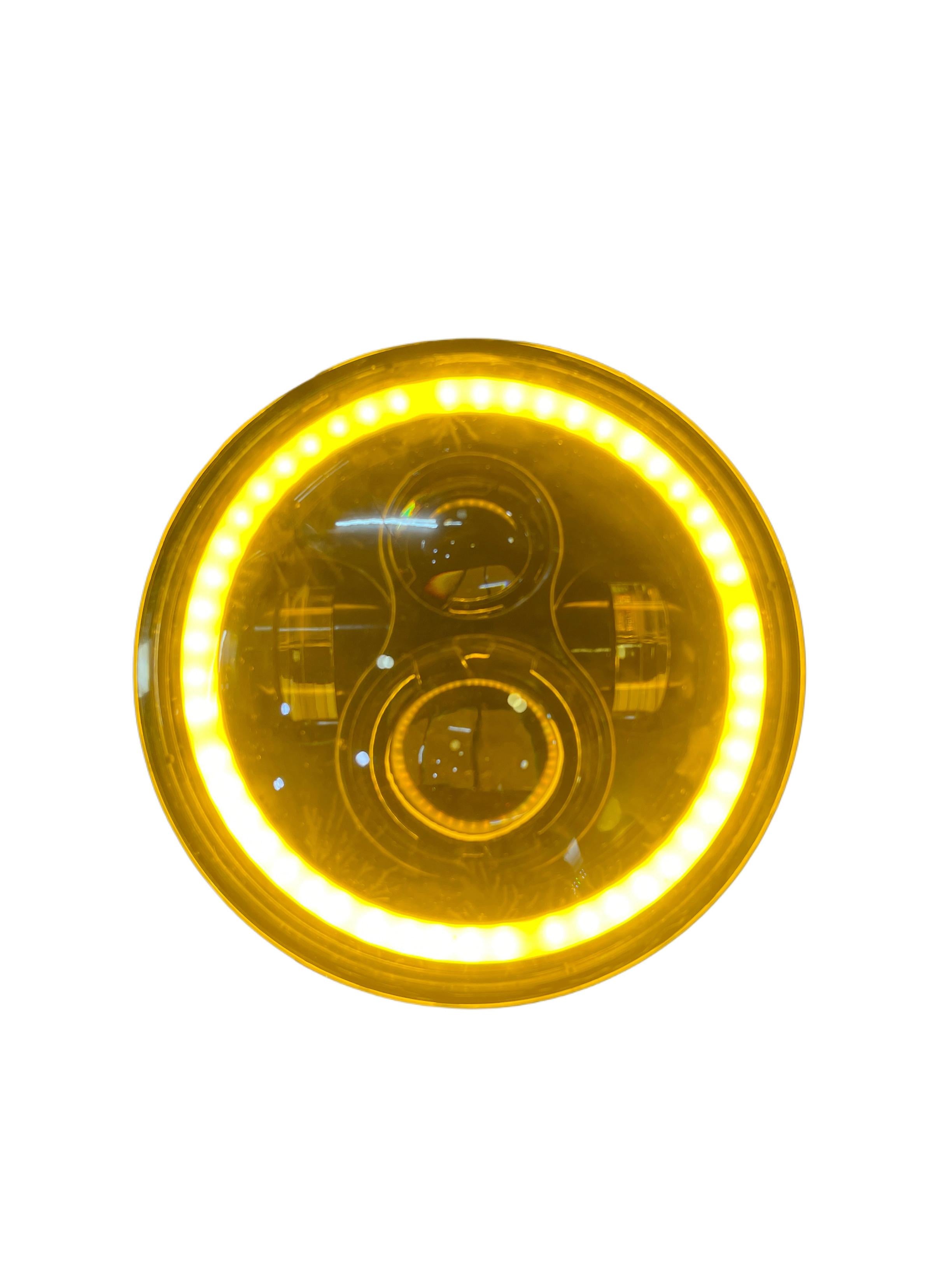 Round headlight with reflective surface on a white background