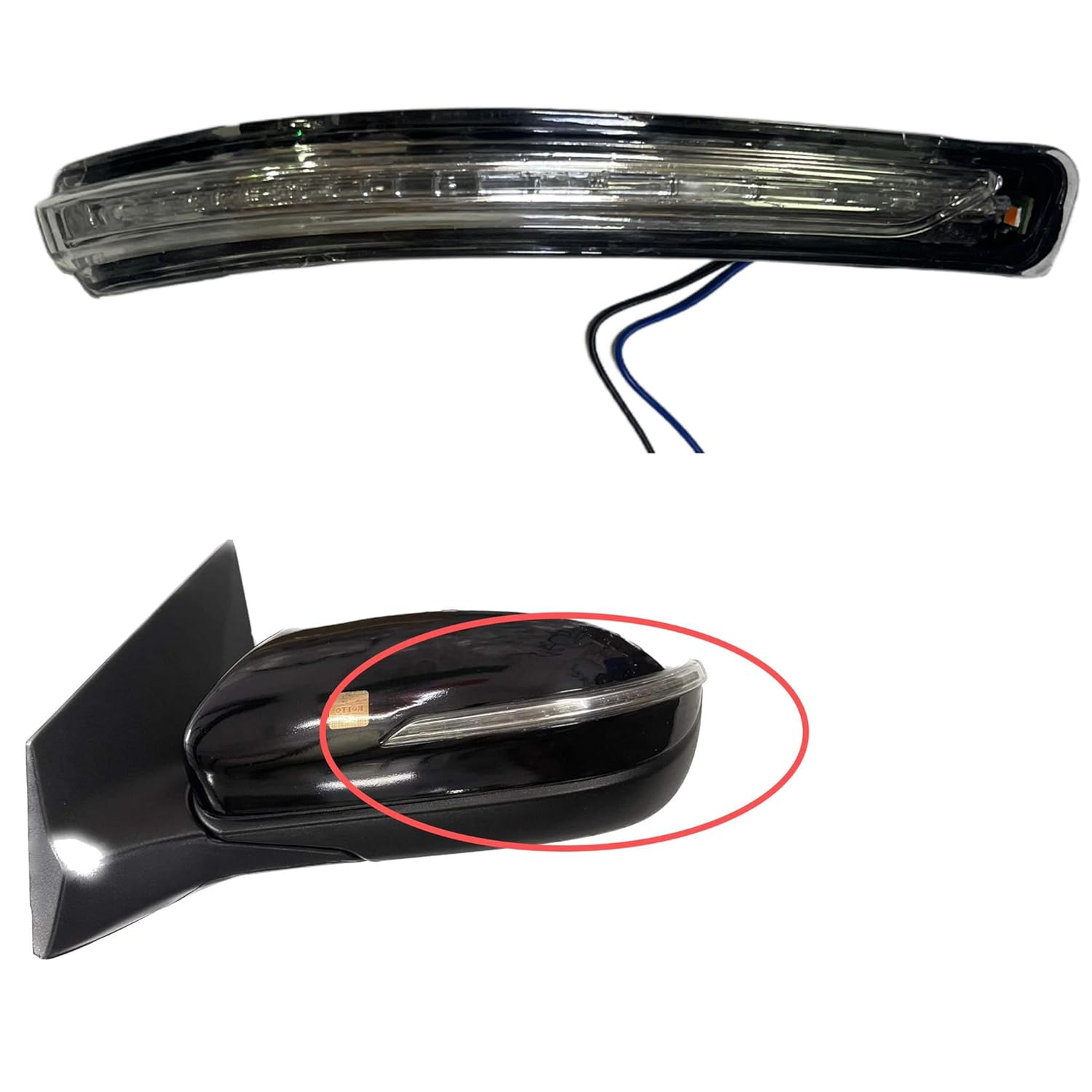 An image showing a black Hyundai I20 side door mirror with a built-in indicator light.