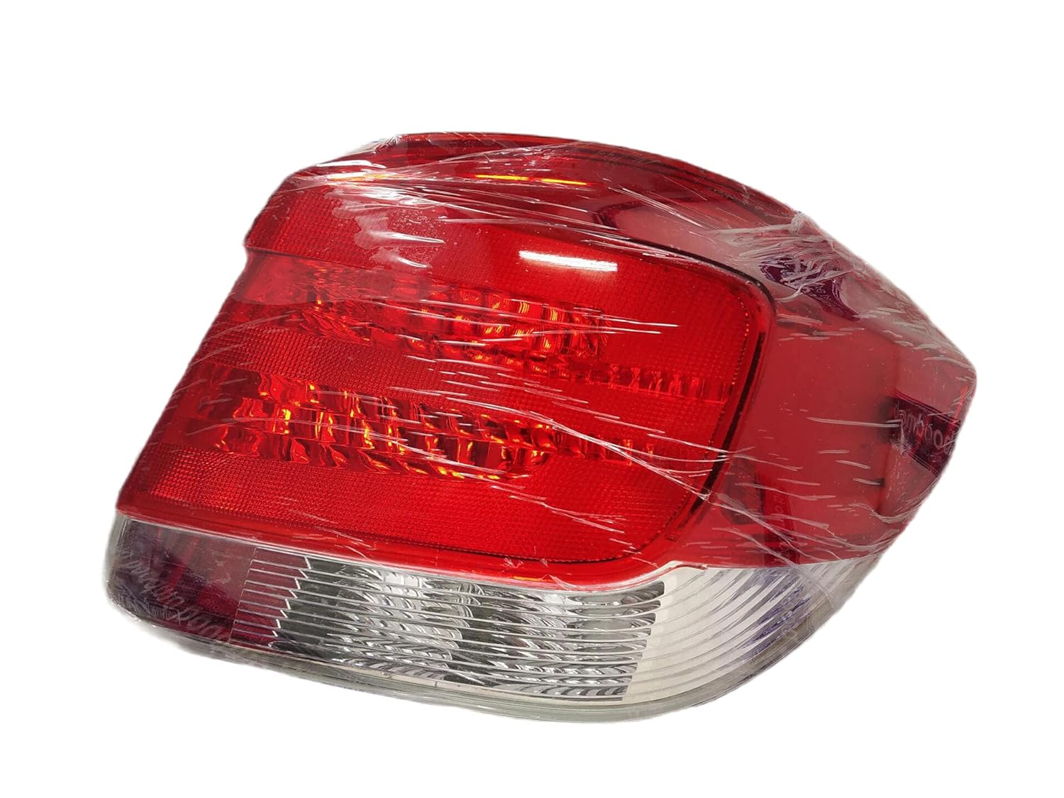 A red tailight/backlight for a Honda Amaze, Type 1, model years 2013-2016, wrapped in plastic.