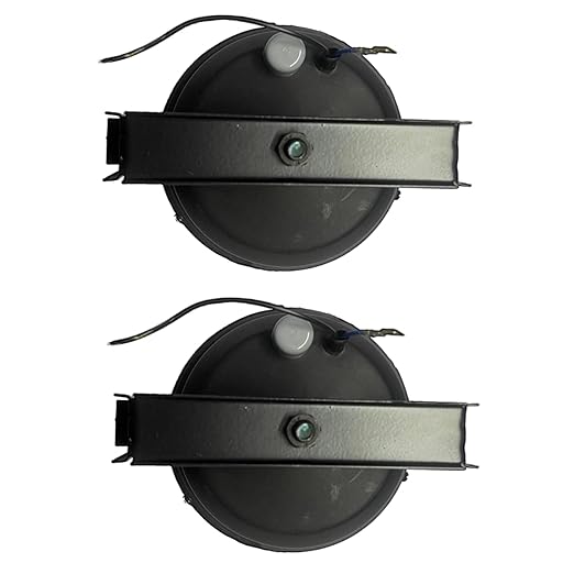 A pair of K D brand fog lights for Mahindra Bolero, with a silver reflective surface and black housing.
