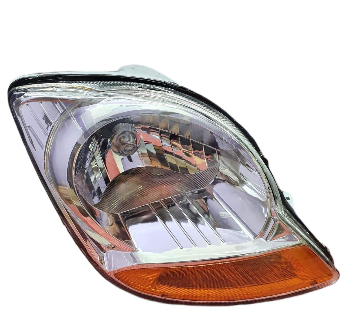 Chrome headlight assembly for a Chevrolet Spark 2007-2016 vehicle, without adjustable motor.