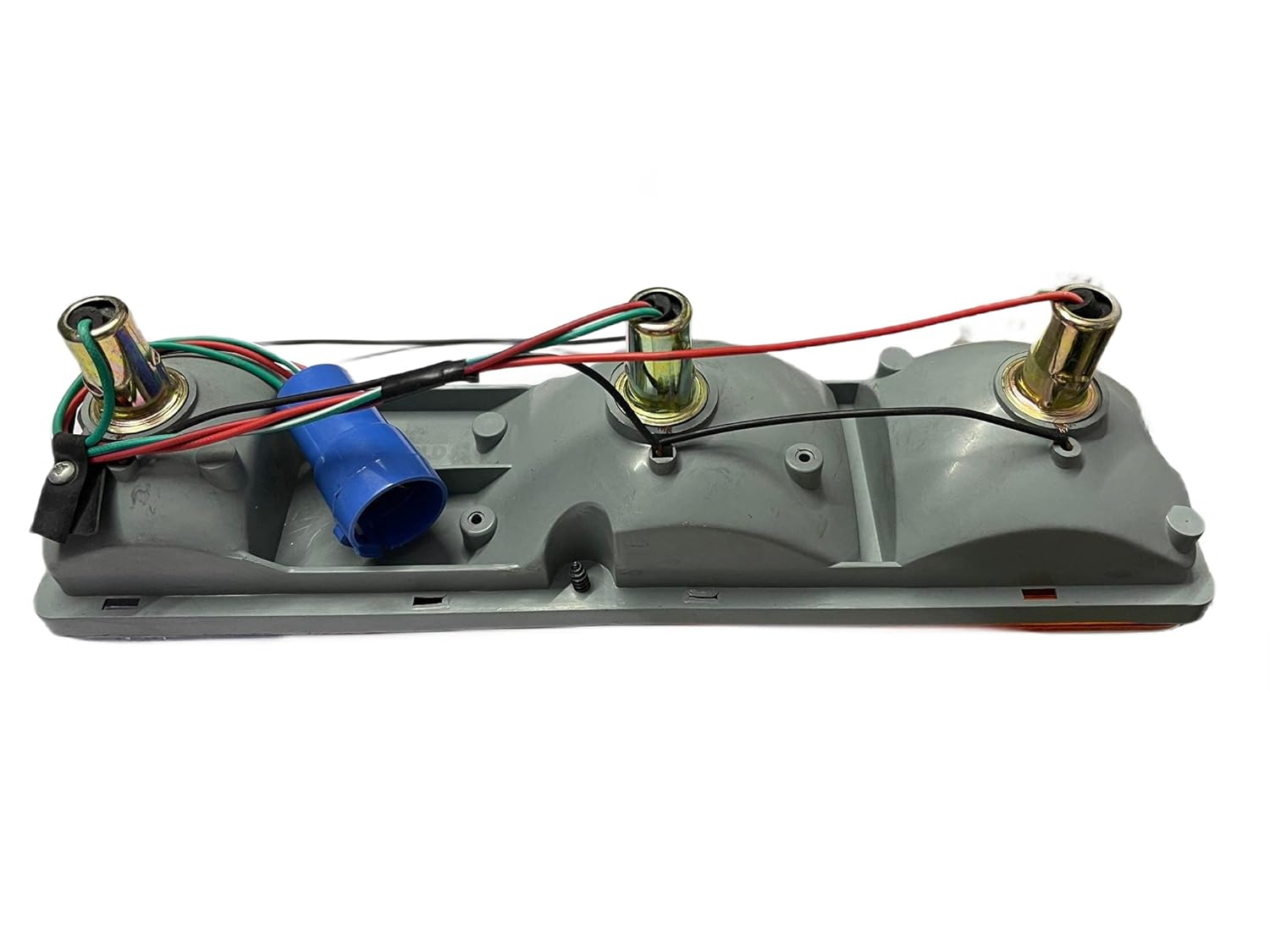 A set of two tail lights for a vehicle, featuring clear, red, and yellow lenses with metal frames.