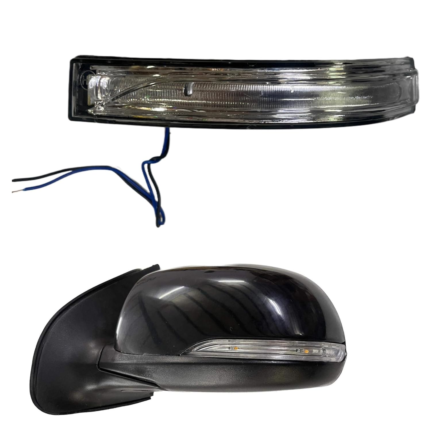 An image showing a black side mirror indicator for a Hyundai I20 along with the mirror itself, against a white background.