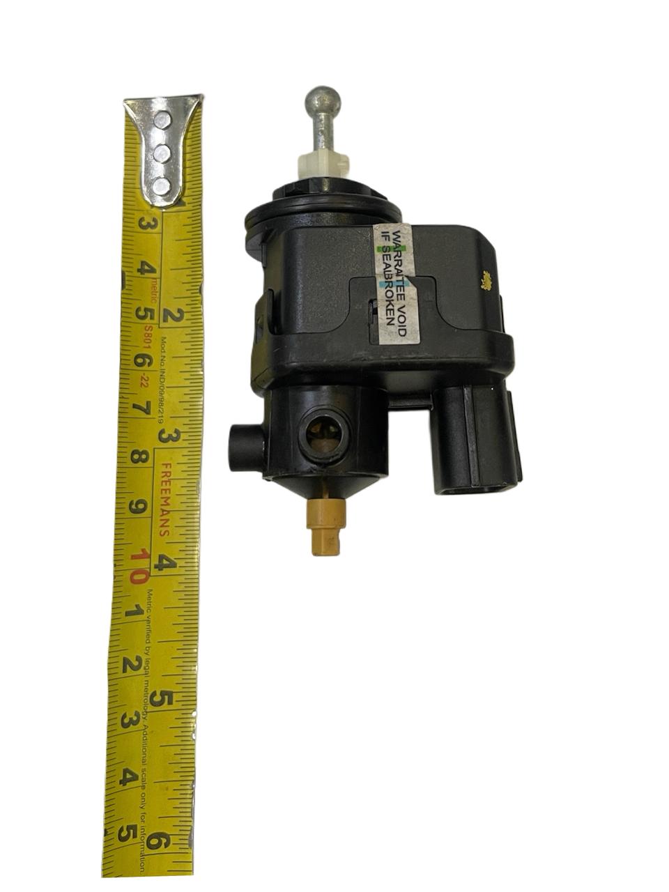 Mechanical component with a measuring tape for scale on a white background