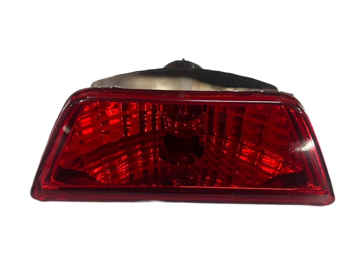 A red rear bumper light for a Maruti Wagonr (2006-2010) model, showing the light and the back of a vehicle with a visible license plate.