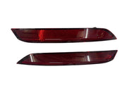 A pair of red rear bumper lights for VW Polo T2.
