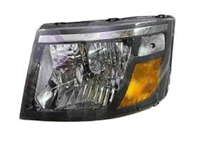 A pair of headlight assemblies for Mahindra Supro, featuring clear lenses and yellow-colored reflectors.