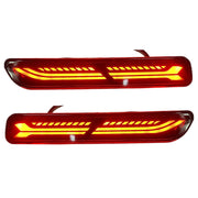A pair of red K D Matrix rear bumper reflectors for Maruti vehicles, featuring a clear acrylic lens and a red-black-clear design.