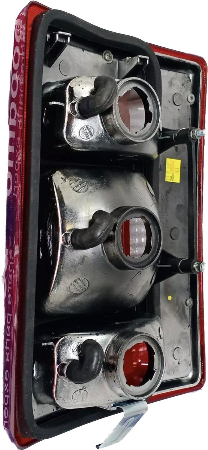 Red tail light assembly for Tata Winger 2007-2016 with clear lens and breakproof glass.