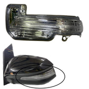 A K D brand side mirror indicator for vehicles, showing both the mirror assembly with built-in turn signal and the mirror's reflection in a separate image.