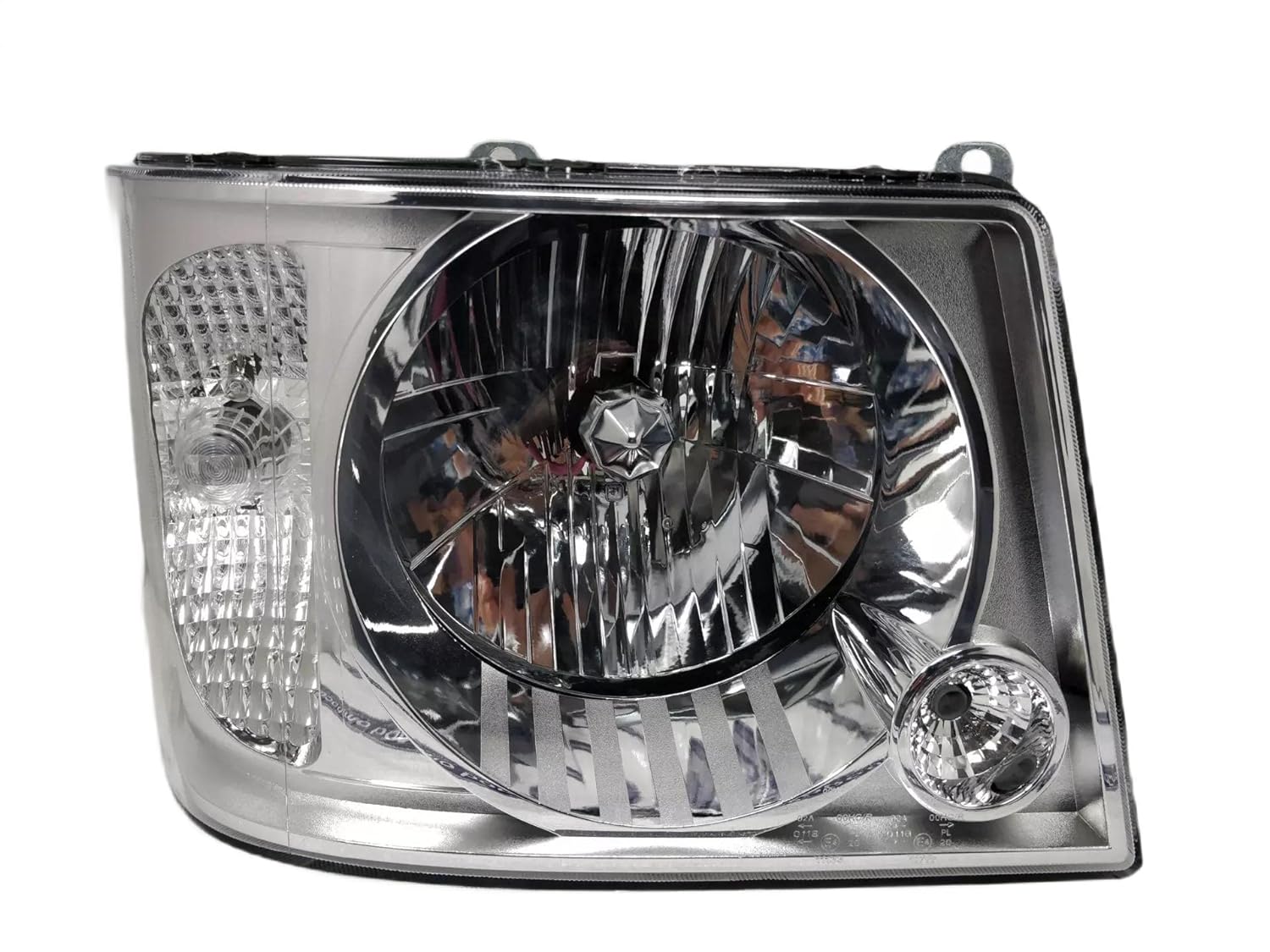 A silver K D headlight for Tata Sumo Victa, showing the front view with the bulb and reflector visible.