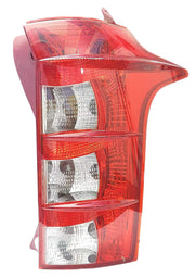 A red tail light for a vehicle, presumably made of plastic and glass, with a clear and red color scheme.