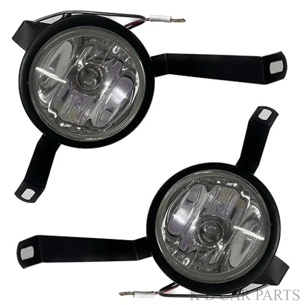 A pair of fog lamps for Chevrolet Sail, including bulbs, with a black rim design.