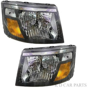 A pair of headlight assemblies for Mahindra Supro, featuring clear lenses and yellow-colored reflectors.
