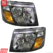 A pair of headlight assemblies for Mahindra Supro, featuring clear lenses and yellow-colored reflectors.