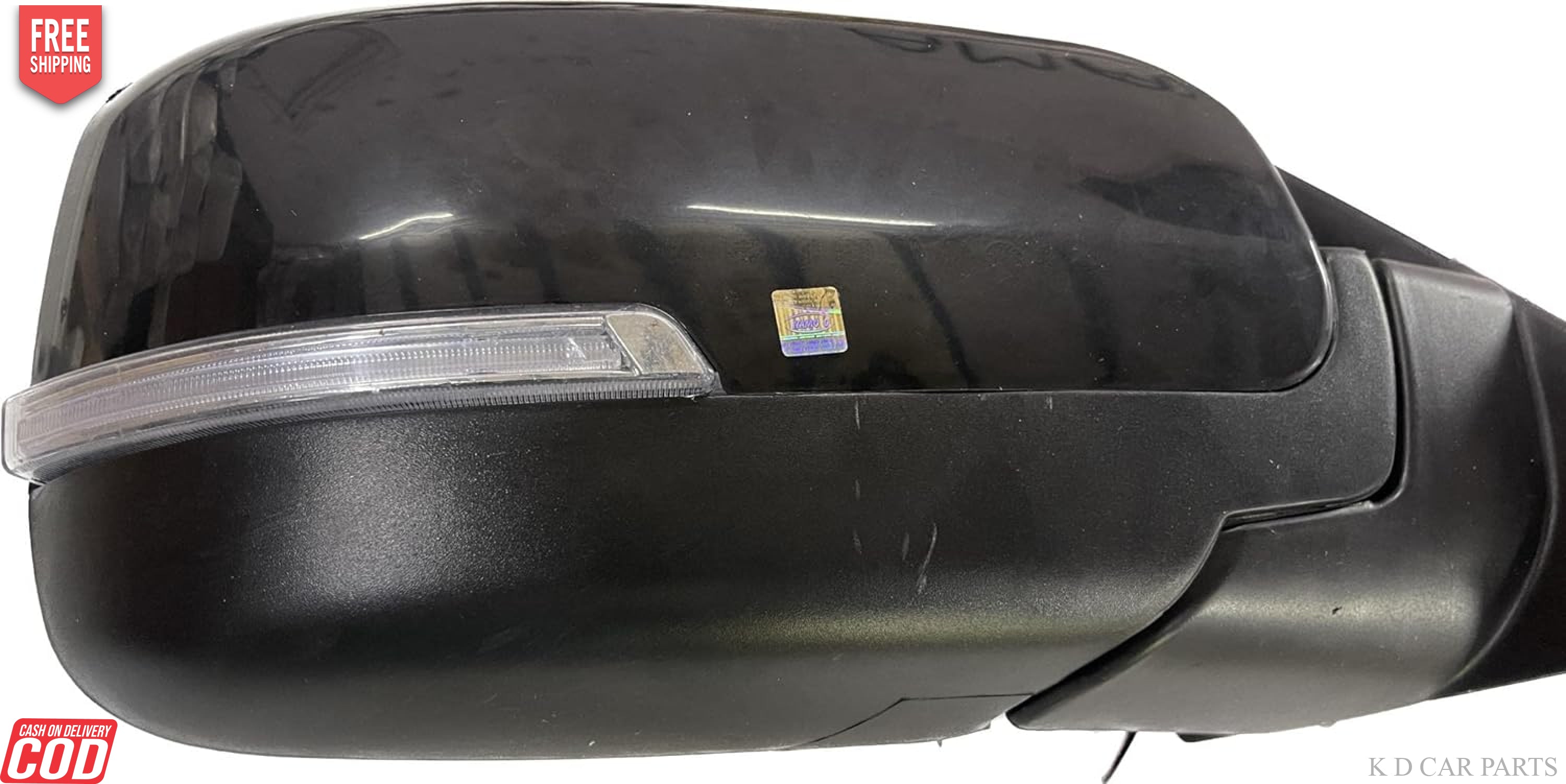 A black door/side mirror for a Mahindra Scorpio Mhawk with visible wires and an indicator.