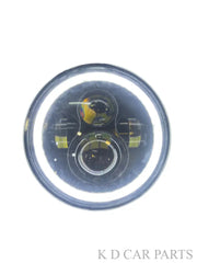 Round headlight with reflective surface on a white background