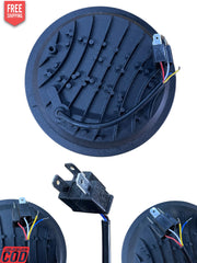 Round speaker driver with wiring on a white background