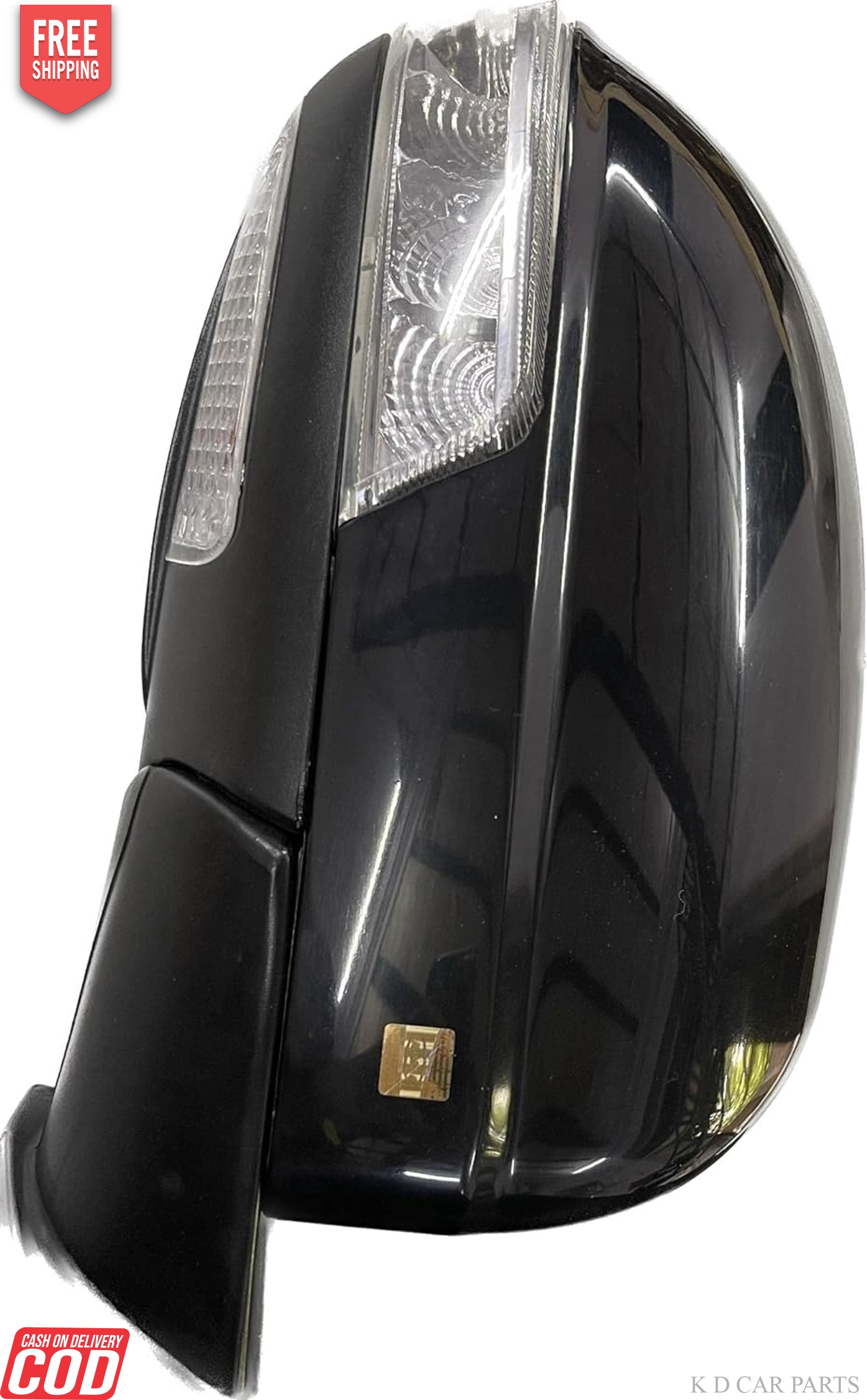 A black K D brand door mirror for a Mahindra XUV 500 motor vehicle with an indicator, showing the mirror glass and the backing plate with wiring.