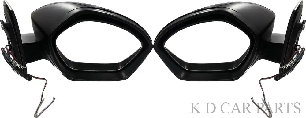 A pair of black, curved door/side mirrors for TATA NEXON motor vehicles with indicator lights, featuring a shatter-resistant acrylic mirror design.