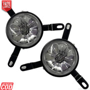 A pair of KD brand fog lamps for Chevrolet Tavera Type 2 vehicles, featuring a silver-colored bulb and black rims.
