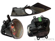 Car headlight assembly with lens and housing on a white background