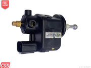 Black mechanical component with gold and silver parts on a white background