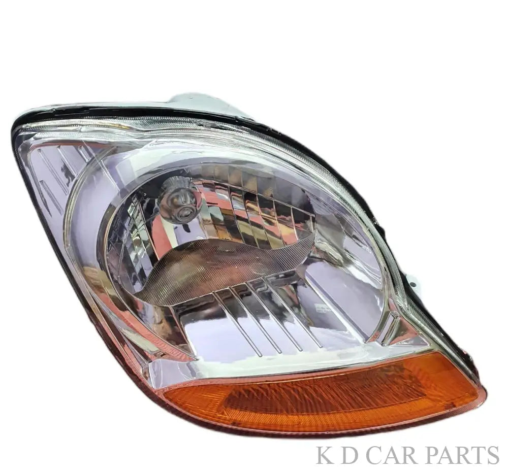 Chrome headlight assembly for a Chevrolet Spark 2007-2016 vehicle, without adjustable motor.
