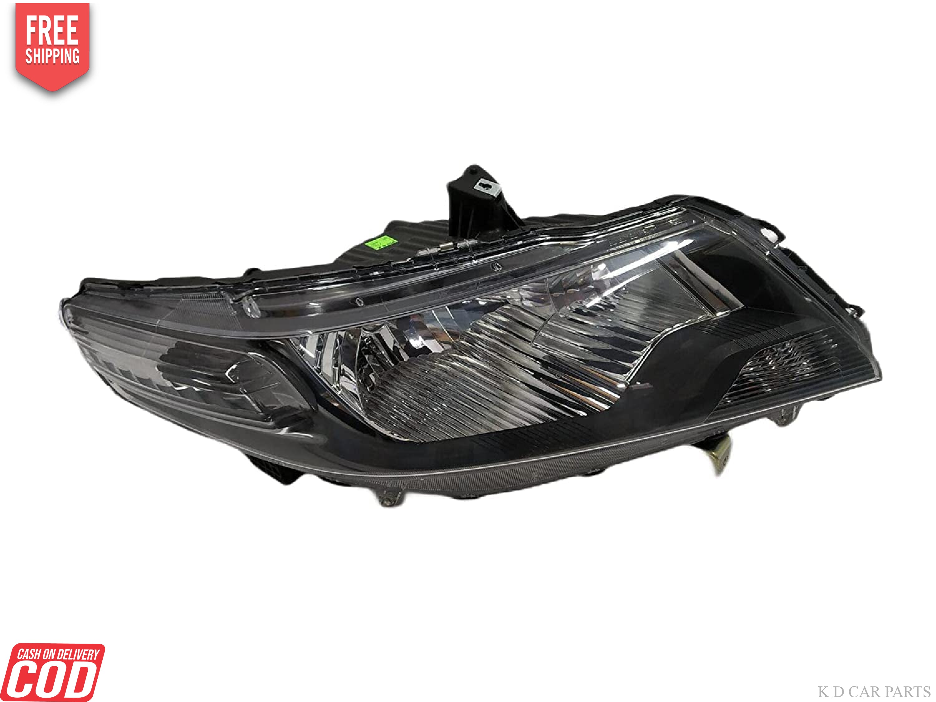 A black K D brand headlight assembly for Honda City IVTEC 2009-2013 without adjustable motor.