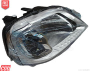 A single chrome-plated headlight assembly for a Mahindra Logan vehicle. The headlight is shatter-resistant and has a clear lens cover.