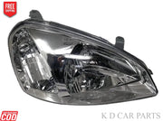 A K D brand headlight assembly designed for specific Tata vehicle models, showcasing a clear lens and reflective interior.