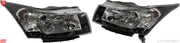 A pair of KD brand headlights for a Chevrolet Cruze, featuring a clear lens and a black frame.