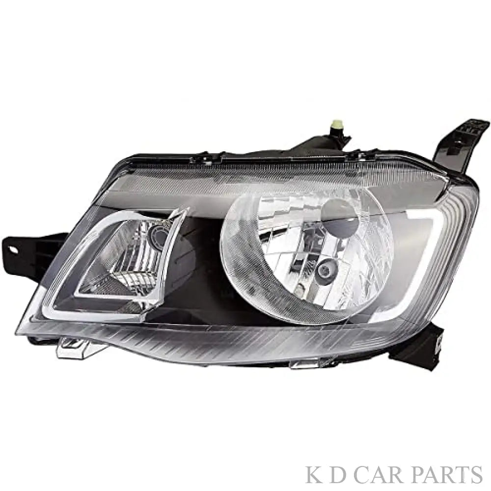 A K D brand headlight for KWID vehicle, featuring a clear lens with a black interior and a visible bulb.