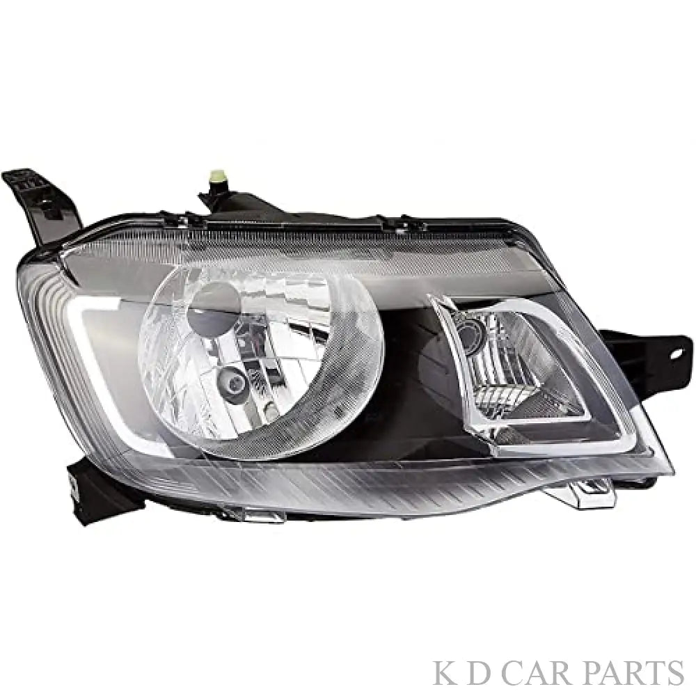 A K D brand headlight for KWID vehicle, featuring a clear lens with a black interior and a visible bulb.