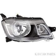 A K D brand headlight for KWID vehicle, featuring a clear lens with a black interior and a visible bulb.