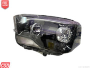 A white K D brand headlight for Mahindra Scorpio vehicle, without projector and with a clear lens.