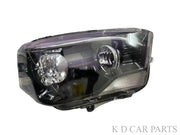 A white K D brand headlight for Mahindra Scorpio vehicle, without projector and with a clear lens.