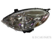A pair of K D brand headlight units for Nissan Sunny, featuring clear lenses and halogen bulbs, without adjustable motors.