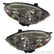 A pair of K D brand headlight units for Nissan Sunny, featuring clear lenses and halogen bulbs, without adjustable motors.