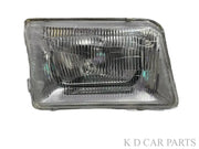 A single headlight for Tata 207 DI vehicle model, featuring a clear, water-resistant, break-proof glass lens with a silver-colored reflector.