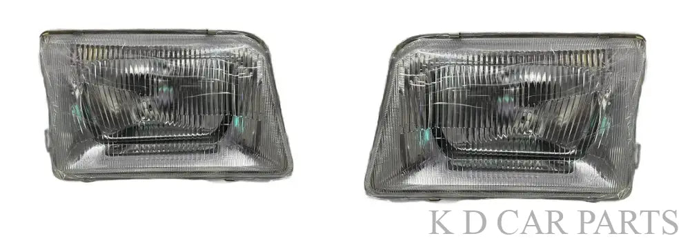 A single headlight for Tata 207 DI vehicle model, featuring a clear, water-resistant, break-proof glass lens with a silver-colored reflector.