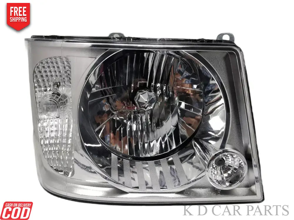 A silver K D headlight for Tata Sumo Victa, showing the front view with the bulb and reflector visible.