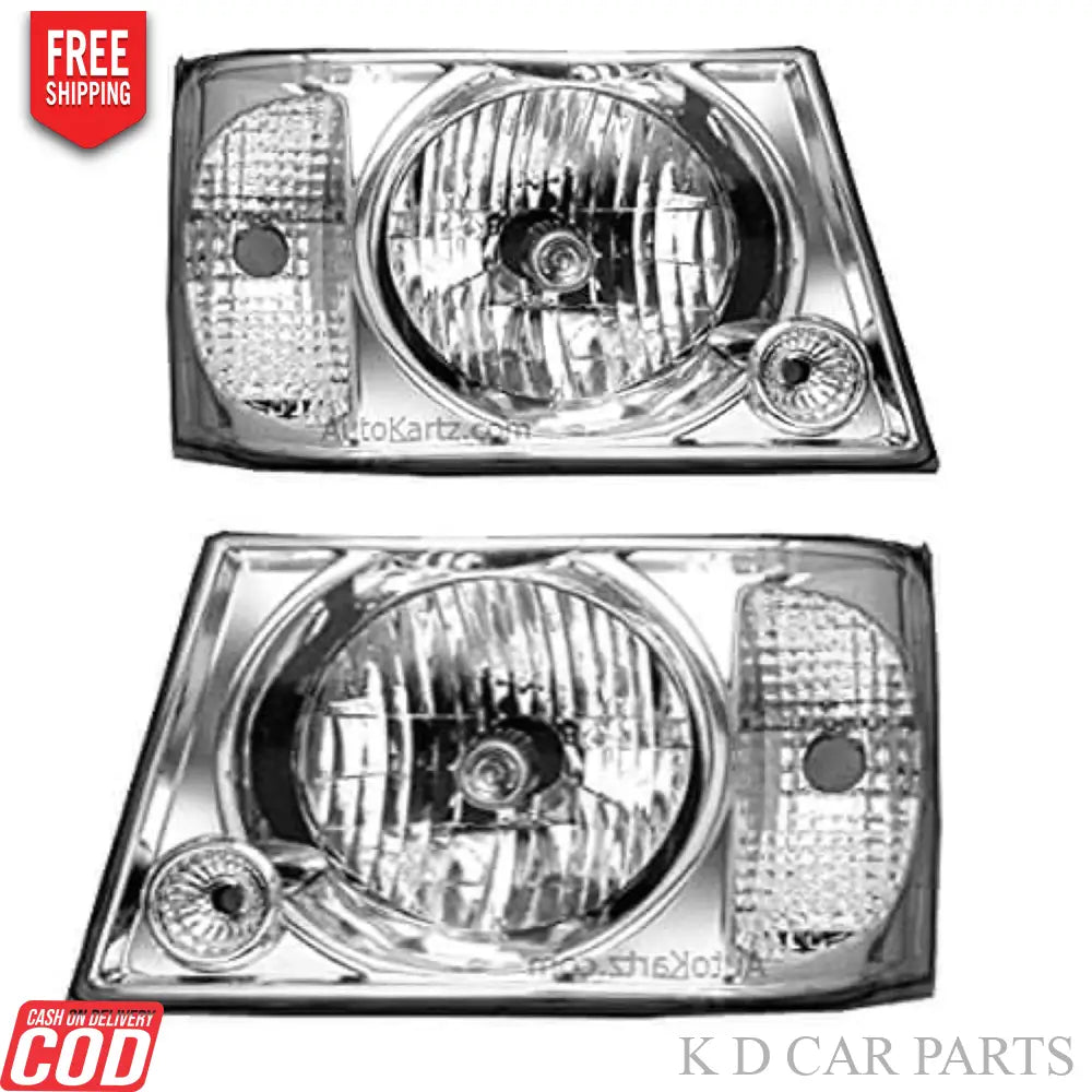 A silver K D headlight for Tata Sumo Victa, showing the front view with the bulb and reflector visible.