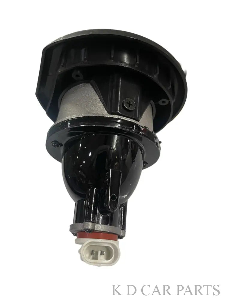 Two black round lights with chrome centers on a white background