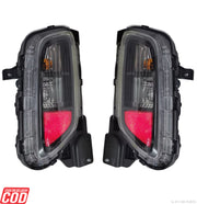 A K D brand rear bumper light for Grand Vitara/Hyryder vehicles, featuring a halogen light source within a clear lens cover assembly.