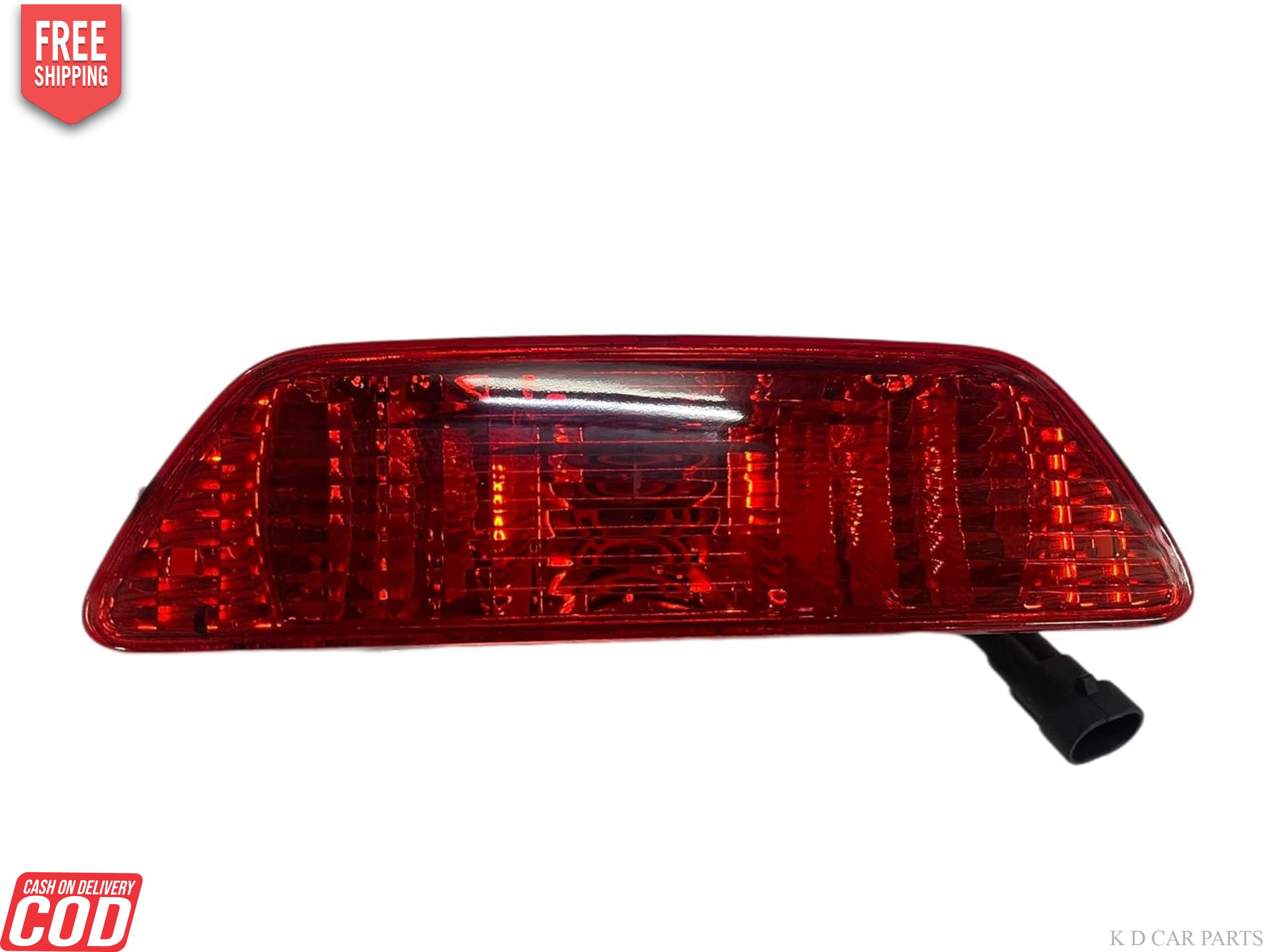 Red rear bumper light for vehicles, with a glass lens and black connector.