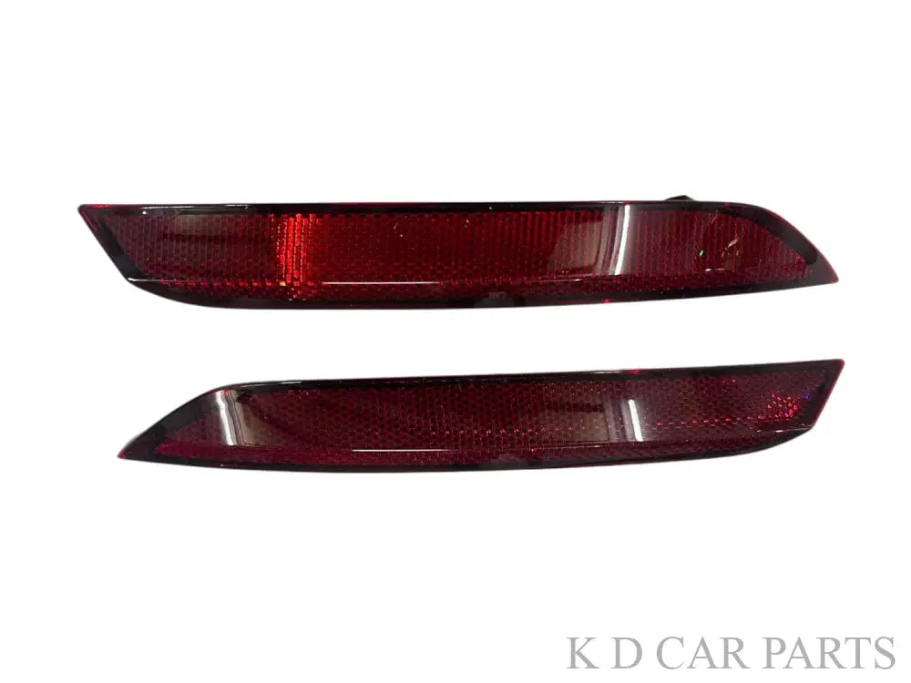 A pair of red rear bumper lights for VW Polo T2.