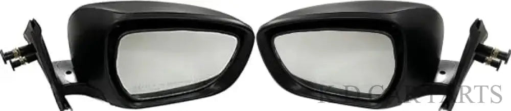 A pair of black, curved side/door mirrors for Maruti Dzire 2017-Now with non-adjustable design, featuring shatter-resistant acrylic mirrors and sturdy ABS plastic casing.